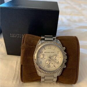 Silver MK watch